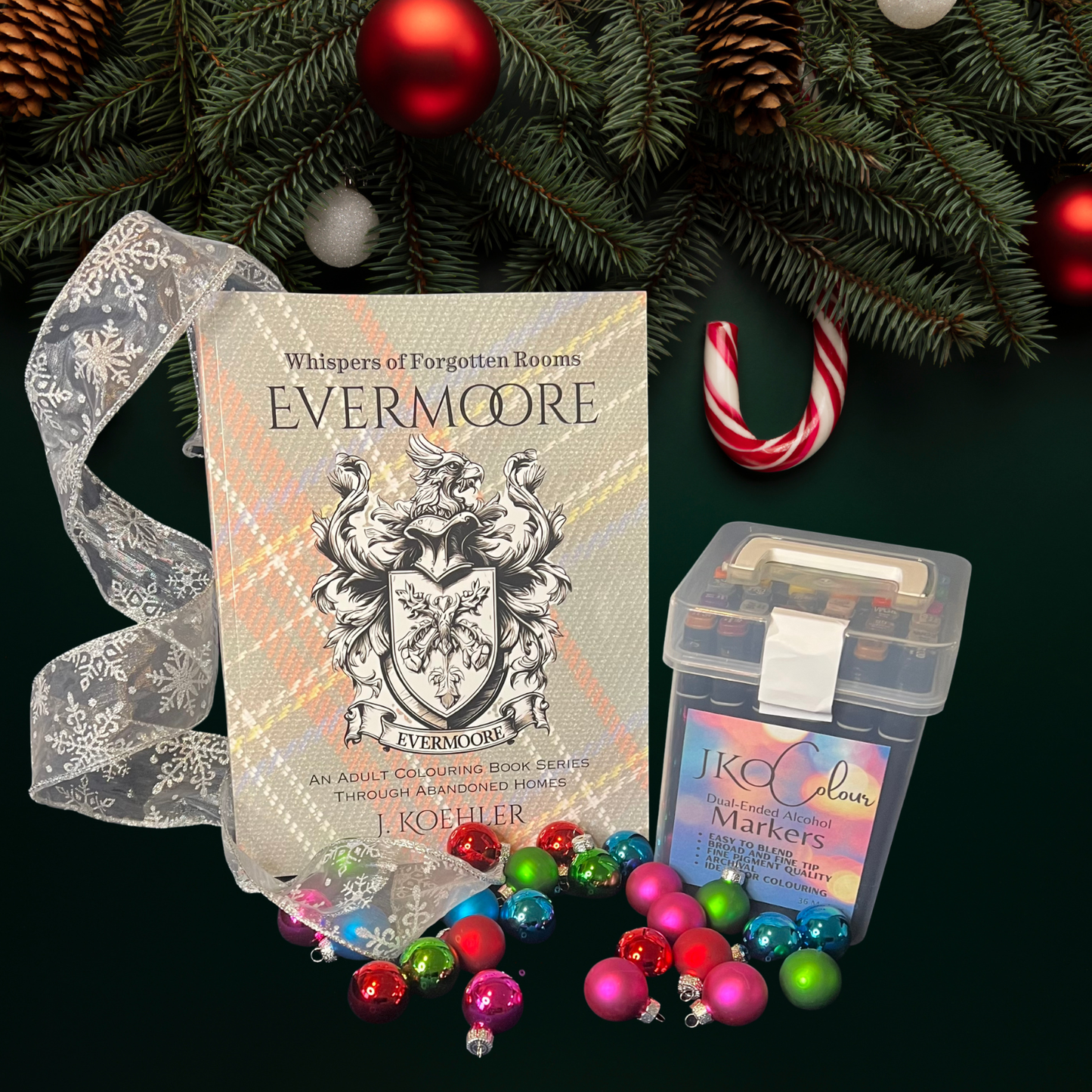 Evermoore book with markers and Christmas decorations on a dark background gift bundle
